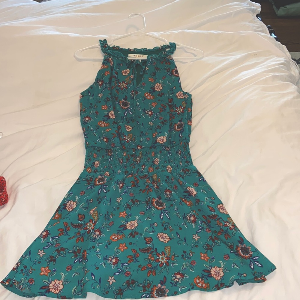 Miami xxs turquoise floral dress. SO FLATTERING and cute! Only worn once!